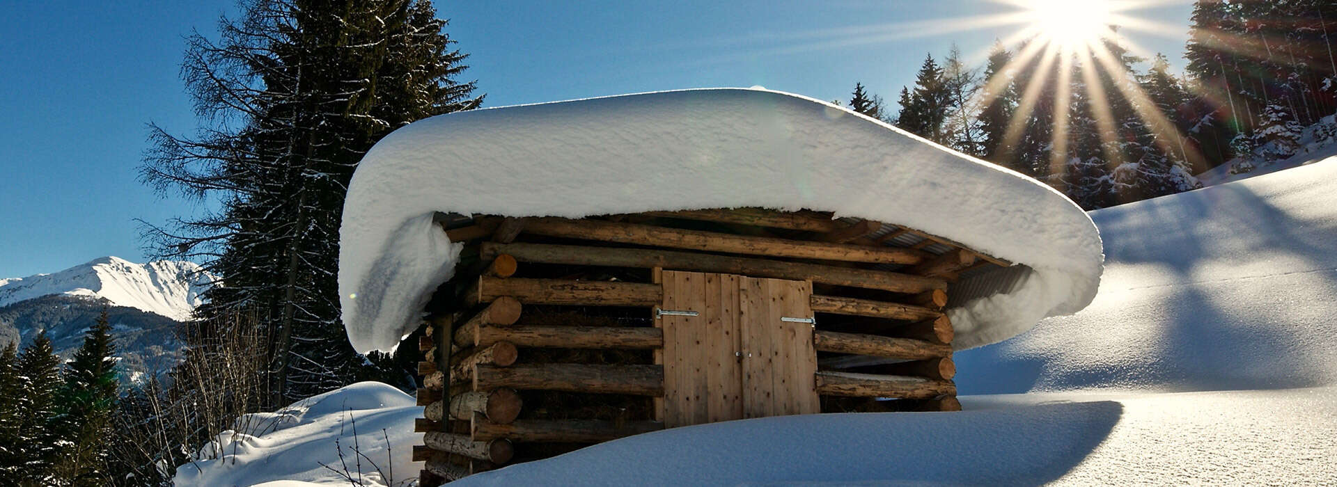 wooden hut in winter